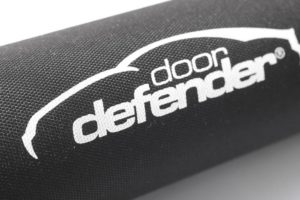 Close up shot of Doordefender car door protector logo